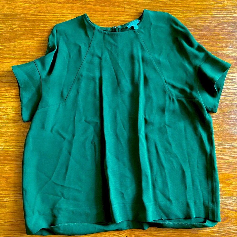 Dark green COS top with flutter sleeves, size 10
